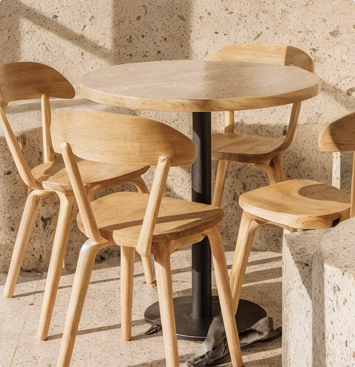 A pixelated image of an orange and white cat lying down, looking to the side, with blurred greenery in the background